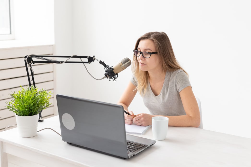 Radio Host Concept - Young Woman Working as Radio Host at Radio Station